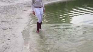 Walking in the lake soaking my brown riding boots